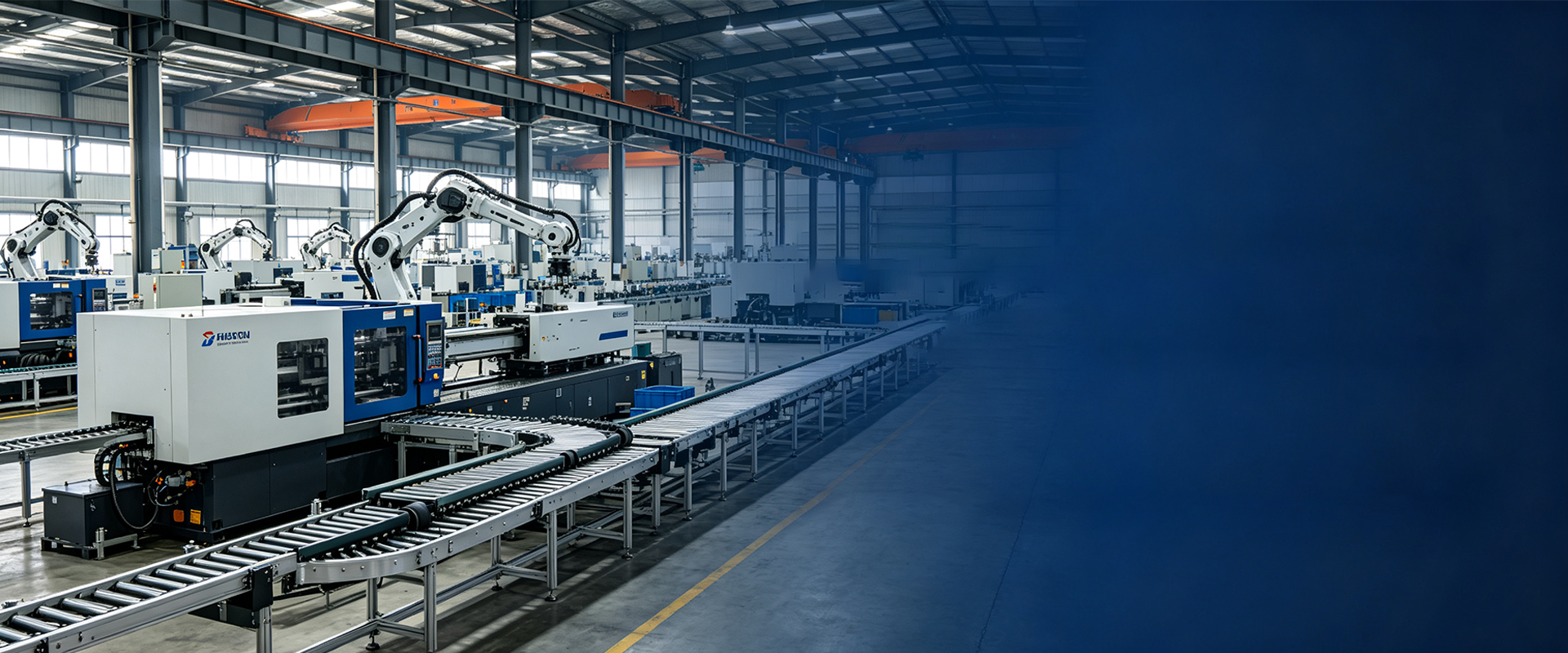 Injection molding machines and robotic arms on the Jiangyin production floor